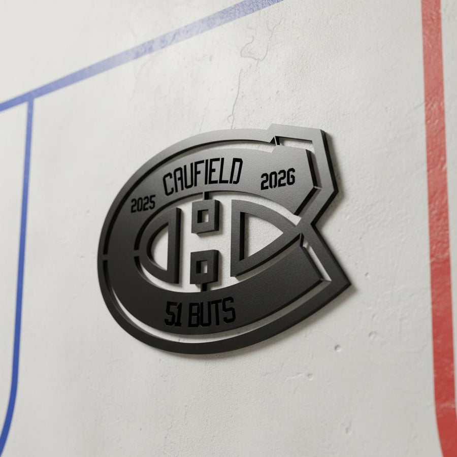 Découpe laser fait de bois en mémoire du 51e but de la saison 2025-2026 de Cole Caufield.