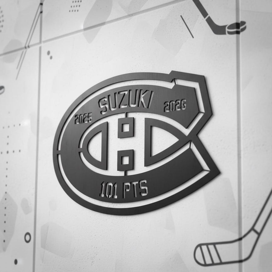 Découpe laser fait de bois en mémoire du 101e points de la saison 2025-2026 de Nick Suzuki.